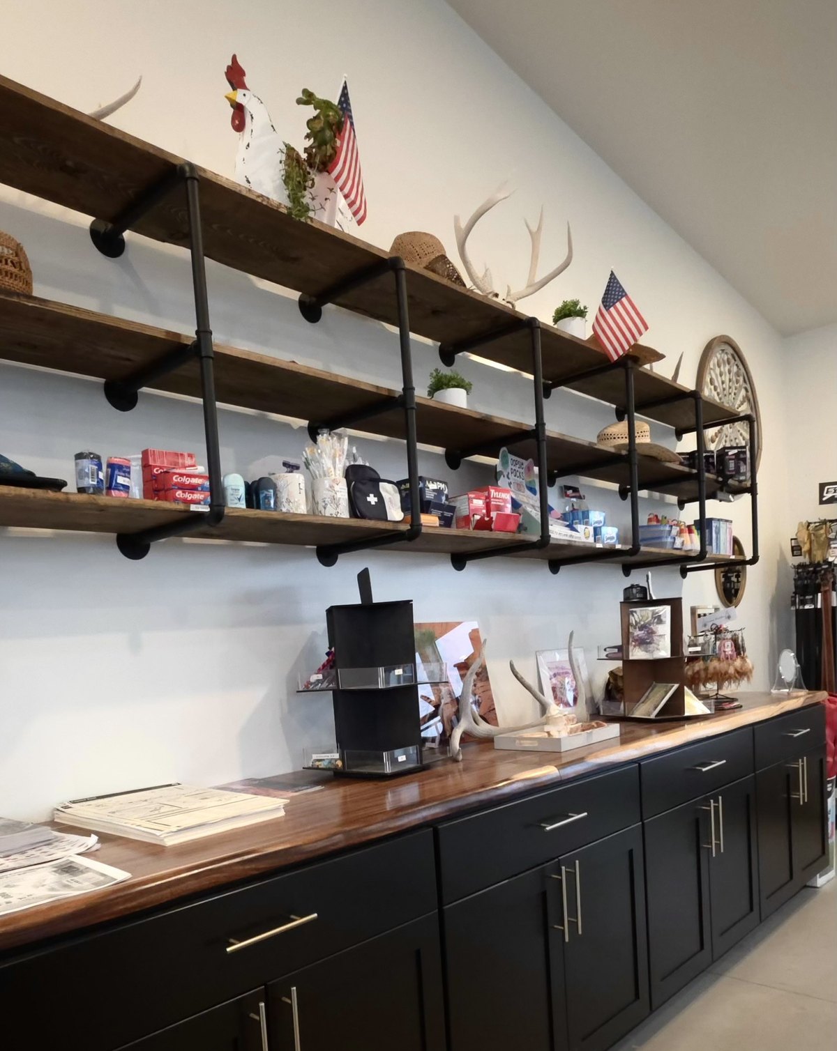 Gift shop counter and shelves along the wall